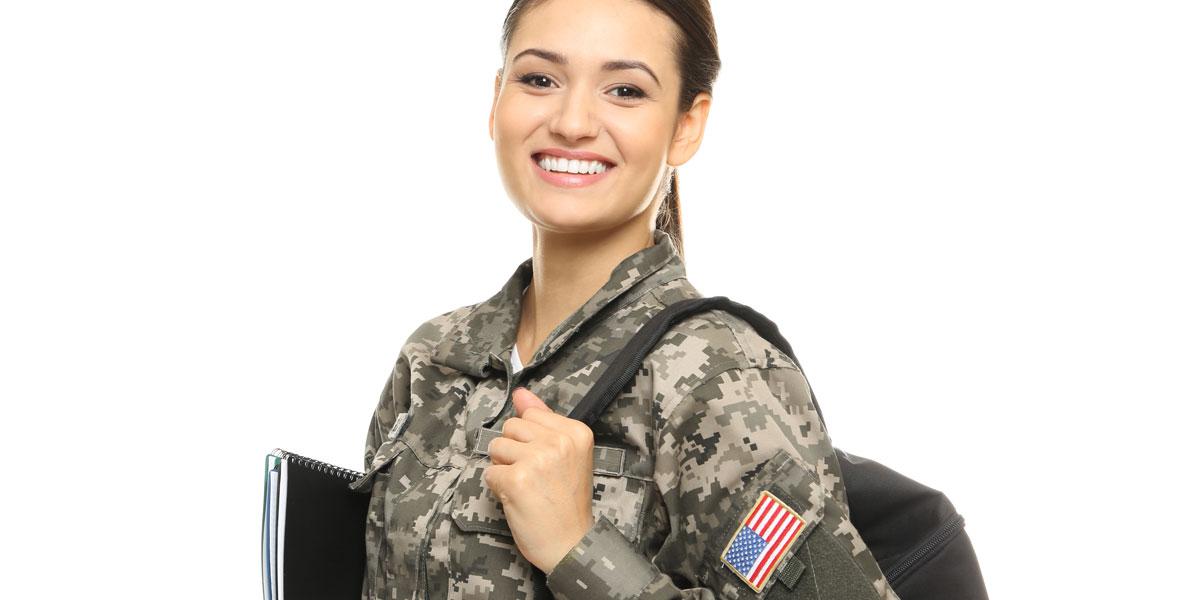 Military woman in uniform with backpack and books.